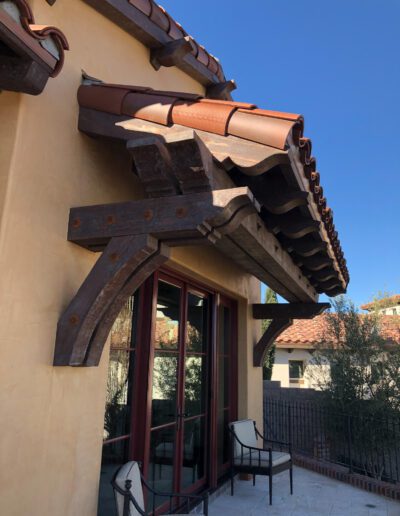 A patio with a patio table and chairs.