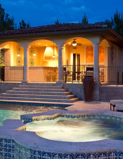 A pool with a hot tub.