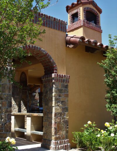 A brick building with a clock on it.