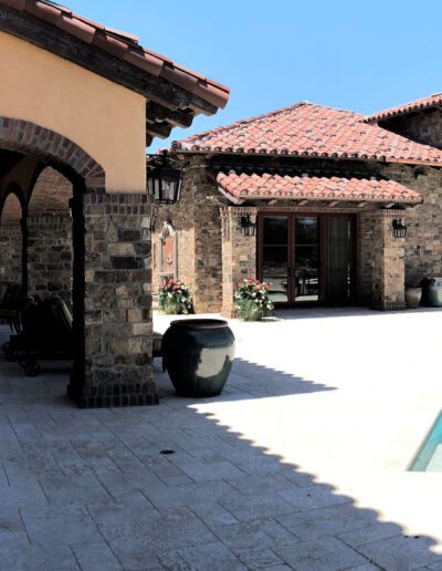 A house with a pool and patio.